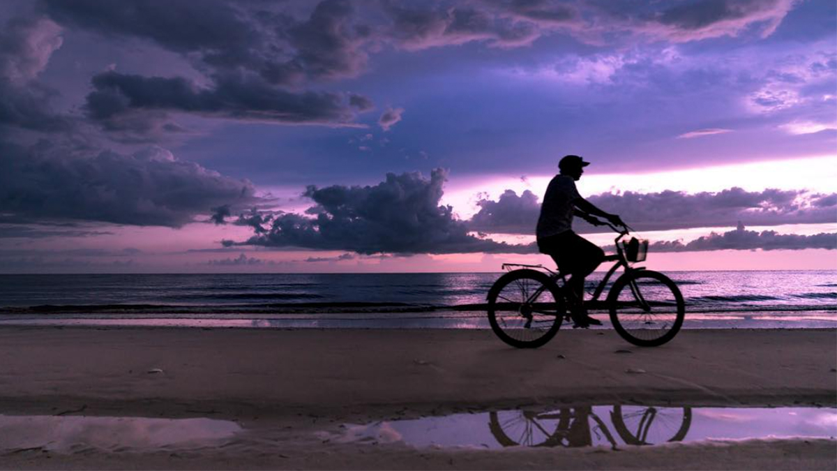 travel photography bike on beach artisanhd