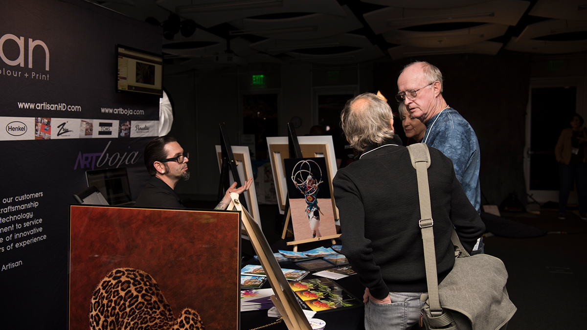 Professional Photographer AzPPA Event ArtisanHD Booth Talking To Guests